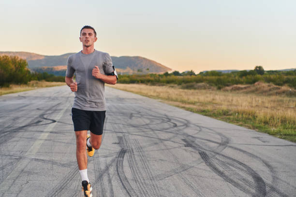 istock A young handsome man running in the early morning hours, driven by his commitment to health and fitness 1511385220