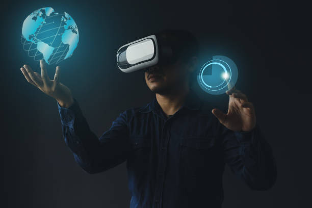 istock Man wearing virtual reality glasses touch hologram 1511431003
