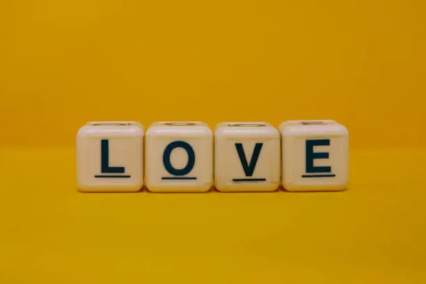 Love letter blocks on yellow background