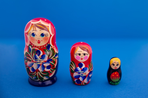 Original Babushka or Matryoshka Nesting Russian Dolls. Colorful, hand painted nesting dolls - traditional symbol of Russia. Photo was taken in old bazaar in Moscow, Russia.