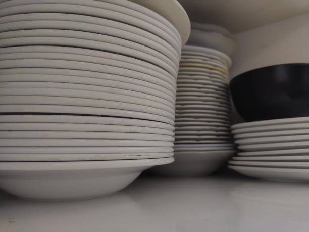 istock pile of clean white plates 1511464120