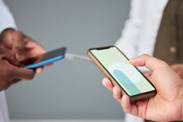 istock Business people, hands and phone screen for networking, communication or sharing information at the office. Mockup of group or community holding mobile smartphone for app, social media or data sync 1511465891