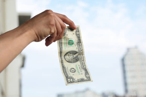 istock Hand holding money us dollar 1511488218
