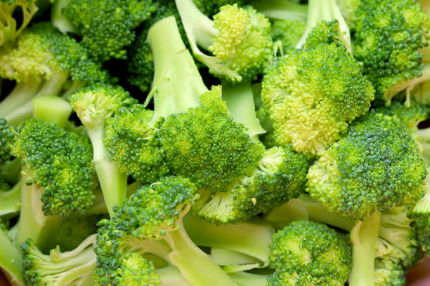 istock Fresh broccoli slices top view closeup. Fresh broccoli cabbage background 1511520277