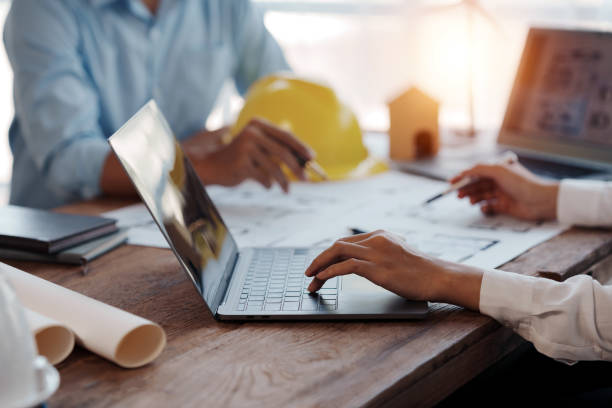 istock Project planning meetings with engineer or architect working together to model home and use engineering tools to create model and blueprint at work. 1511548467