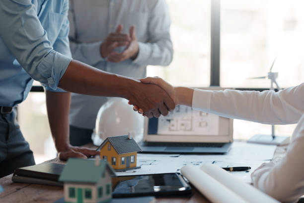 istock Architects and engineers work together and hand in hand to work towards the same goal and work together as a team for the success of the project. 1511548477