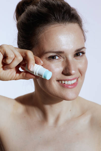 istock happy modern woman with highlighter stick on white 1511561051