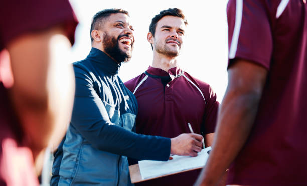 istock Coaching, rugby or happy man writing with a strategy, planning or training progress with a game formation. Leadership, mission or funny guy with sports men or athlete group for fitness or team goals 1511583557