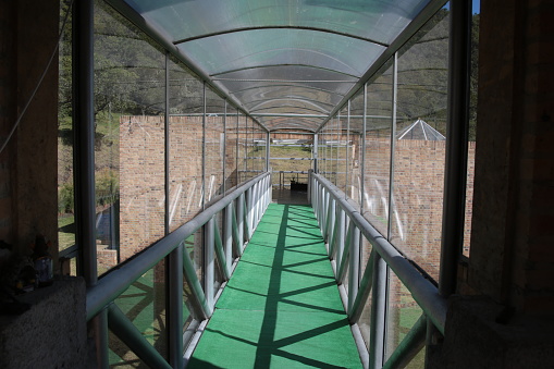 Outstanding architrcture in Encenillos. The bridge comunicates the main house with a full gym