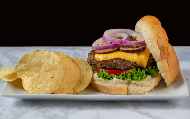 istock cheese burger  top with onions and mushrooms 1511596223
