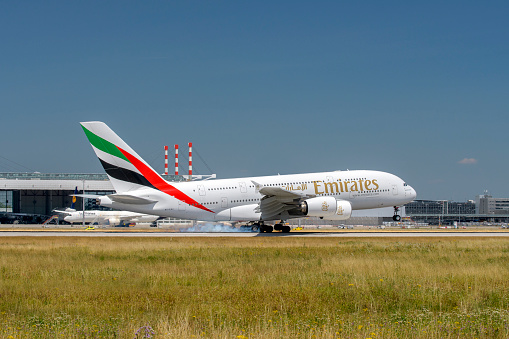 Munich, Germany - June 29. 2023 : Emirates Airbus A380-861 with the aircraft registration A6-EDV during landing to the southern runway 26L of the Munich Airport MUC EDDM