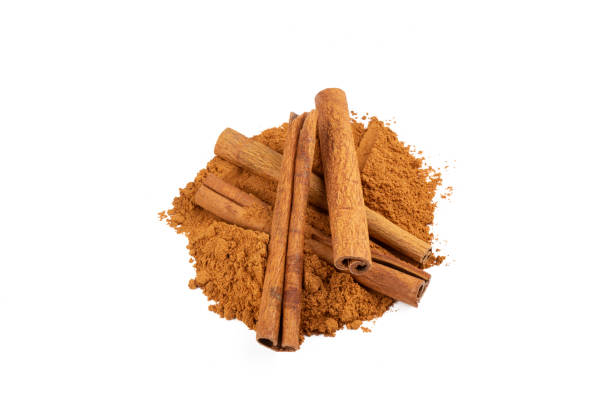 istock Cinnamon stick and cinnamon powder on a white background 1511616201