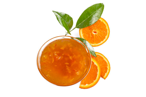 istock Bowl of orange jam isolated 1511620481