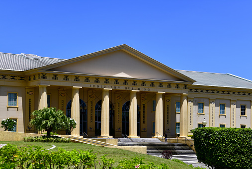 Ngerulmud, Melekeok State, Babeldaob Island, Palau: Capitol of Palau - the neo-classical Judiciary building, the Supreme Court of Palau's Appellate Division - the east wind of the Capitol - imposing hexastyle Doric portico - built high on a hilltop and designed by Hawaiian architect Joseph G. Farrell, who defines himself as 'Subtropical Modernist Architect'.