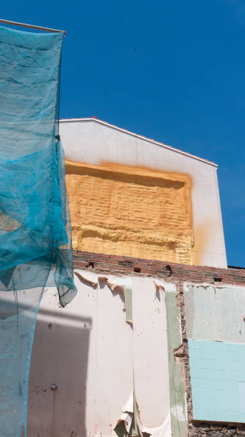 istock Golden foam insulation in construction site 1511677954