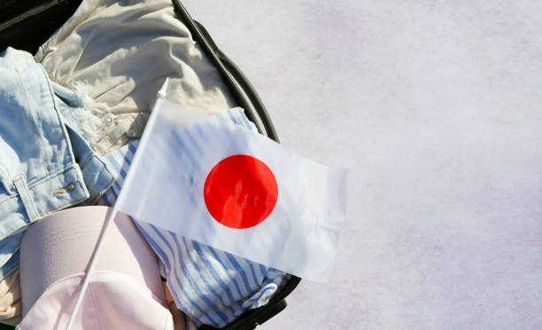 istock Travel to Japan concept. Packing suitcase 1511699586