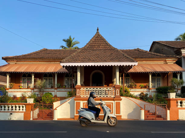 Colonial style weathered building on waterfront, Fort Kochi, Cochin, Kerala, India. Kerala is a colourful Indian state of waterways and tropical rainforest geography on the southwestern Malabar Coast of the country owing its growth to the spice trade created by its Portuguese and British colonial occupiers that is now an attraction for tourists with its river boats and canals