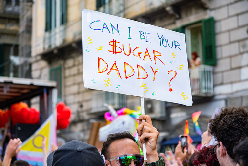 Naples, Italy - July 1, 2023: Some participants in Gay Pride every year brings together thousands of gay people and not to claim the rights to sexual freedom and against homophobia.