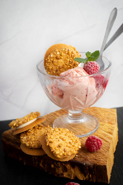 istock Raspberry ice cream in a bowl. on a dark background. Sweet dessert 1511739652