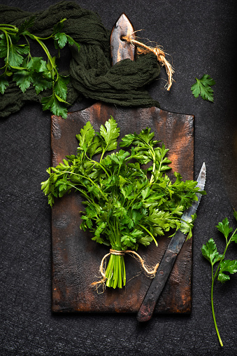 parsley on a wooden board