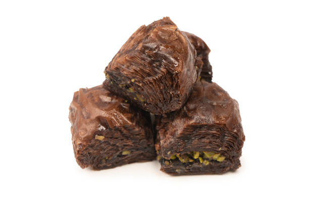 istock Turkish chocolate baklava isolated on white background. 1511779424