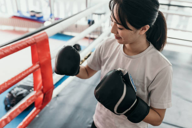 istock Japanese woman practicing boxing 1511871770