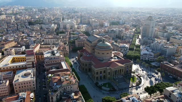 Aerial shot drone orbits to the right around Teatro Massimo in Palermo, Sicily, Italy