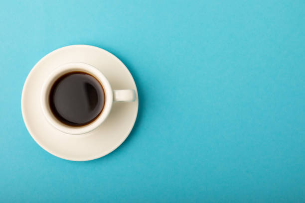 istock Cup of coffee on a blue background. Espresso. View from above. Space for copy. MOCAP. Breakfast. good morning. 1511901279