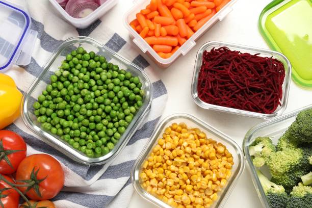 istock Containers with fresh products on white table, flat lay. Food storage 1511905582
