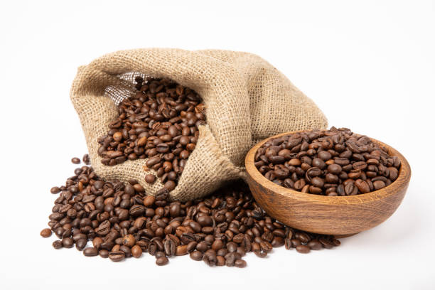 istock Coffee beans in burlap bag isolated on white background. Place for copy space. Place for text. MOCAP 1511912209