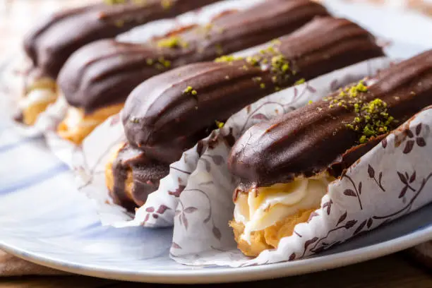 Traditional french eclairs with chocolate.