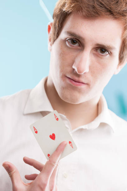 istock Redhead man, blue office, reveals his ace 1511933889