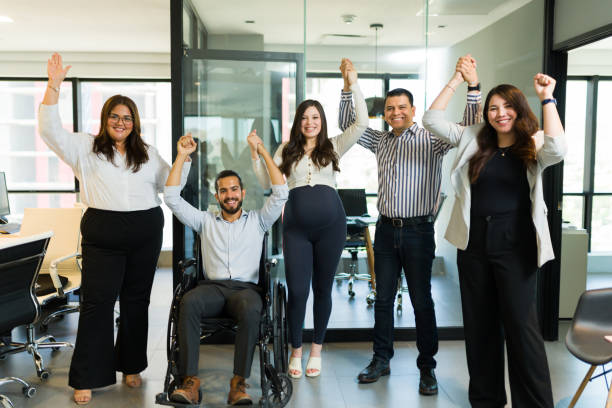 istock Group of diverse office employees celebrating success 1511934362
