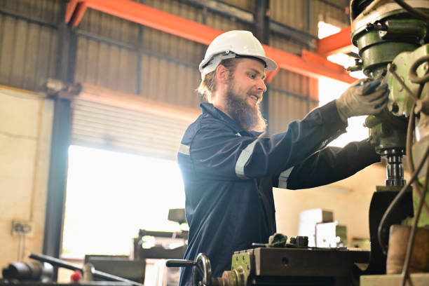 istock Mechanical engineers repairing engine machine at factory 1511946226