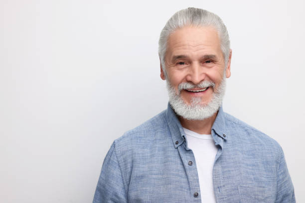 istock Portrait of handsome senior man on white background. Space for text 1511948521