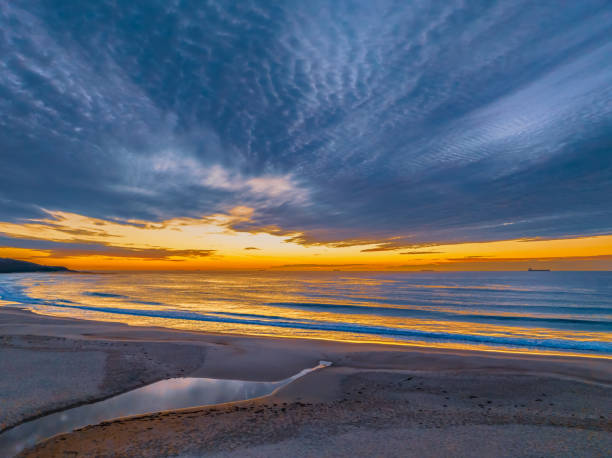 istock Sunrise at the seaside with beautiful cloudcover 1511956106
