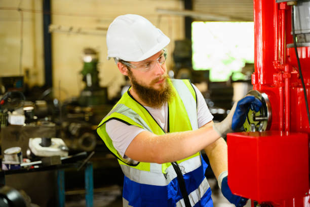 istock Mechanical engineer repairing engine machine at factory 1511968281