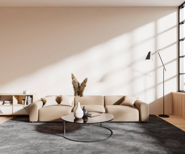 istock Light living room interior with couch and coffee table, window. Mockup wall 1511993490