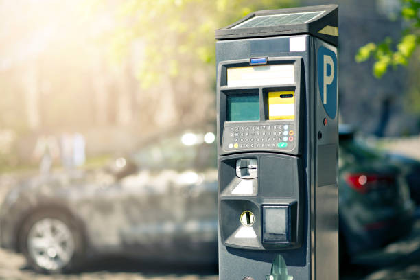 istock Parking machine with solar panel in the city street. Pay On Foot Parking System 1511998859