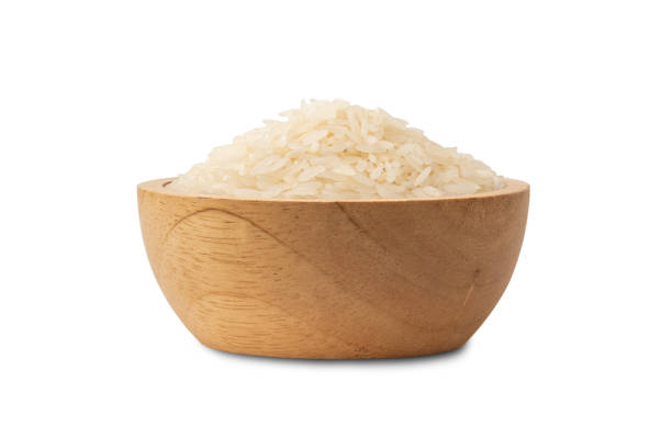 istock uncooked Thai jasmine rice in wooden bowl 1512020815