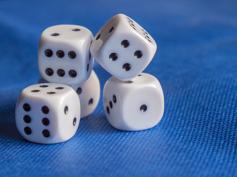 High angle view a dice on gray background with copy space