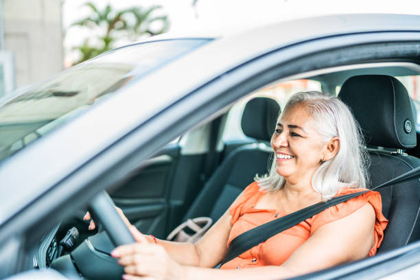 istock Senior woman driving a car 1512041988