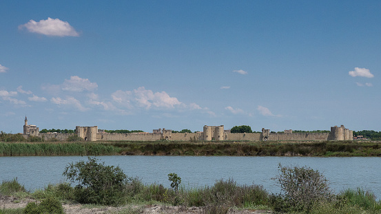 panorama of the walled enclosure of the fortified village of Aigues-Mortes in the Camargue, in the south of France