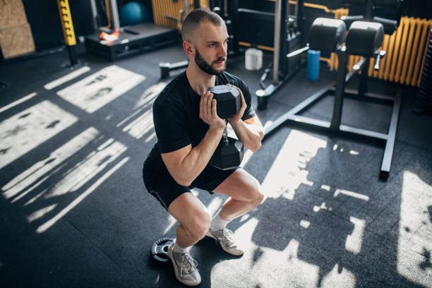 istock Man weightlifting in gym 1512066982