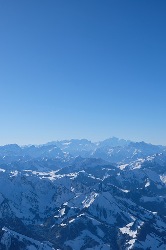 hot air balloon ride over the European Swiss Alps in February Winter, Aerial View Photography