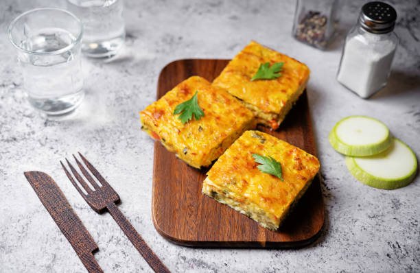 istock Zucchini carrot cheese bacon casserole slices 1512139737