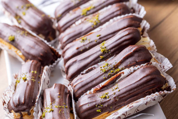 istock Traditional french eclairs with chocolate. 1512205063