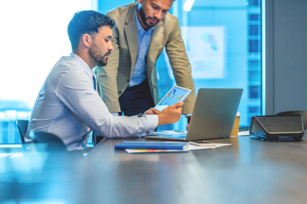 istock 2 business men working in the office. 1512217024