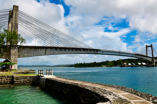 Koror Island / Babeldaob Island, Palau: Koror–Babeldaob Bridge, aka Japan-Palau Friendship Bridge - built by the Kajima Corporation of Japan in 2002, to replace a Korean built bridge, completed in 1978 which collapsed in 1996. Koror Island and Babeldaob Islands are separated by a strait with a width of about 250 m and a depth of about 30m. The bridge received the 2002 Tanaka Award from the Japan Society of Civil Engineers. It is a 3-span Extradosed bridge, combining the main elements of both a prestressed box girder bridge and a cable-stayed bridge. View from the Koror side.