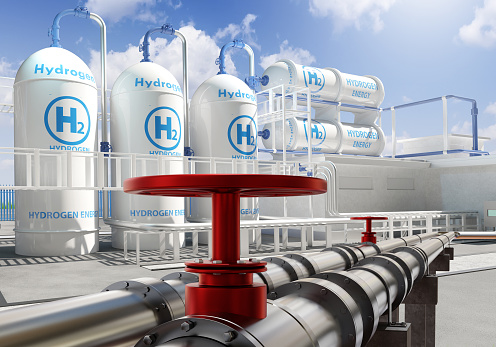 Hydrogen technologies. Tanks with H2 near pipeline. Factory for production of hydrogen gas. H2 power plant. Hydrogen energy. Obtaining eco-friendly energy resources. Plant for green energy. 3d image